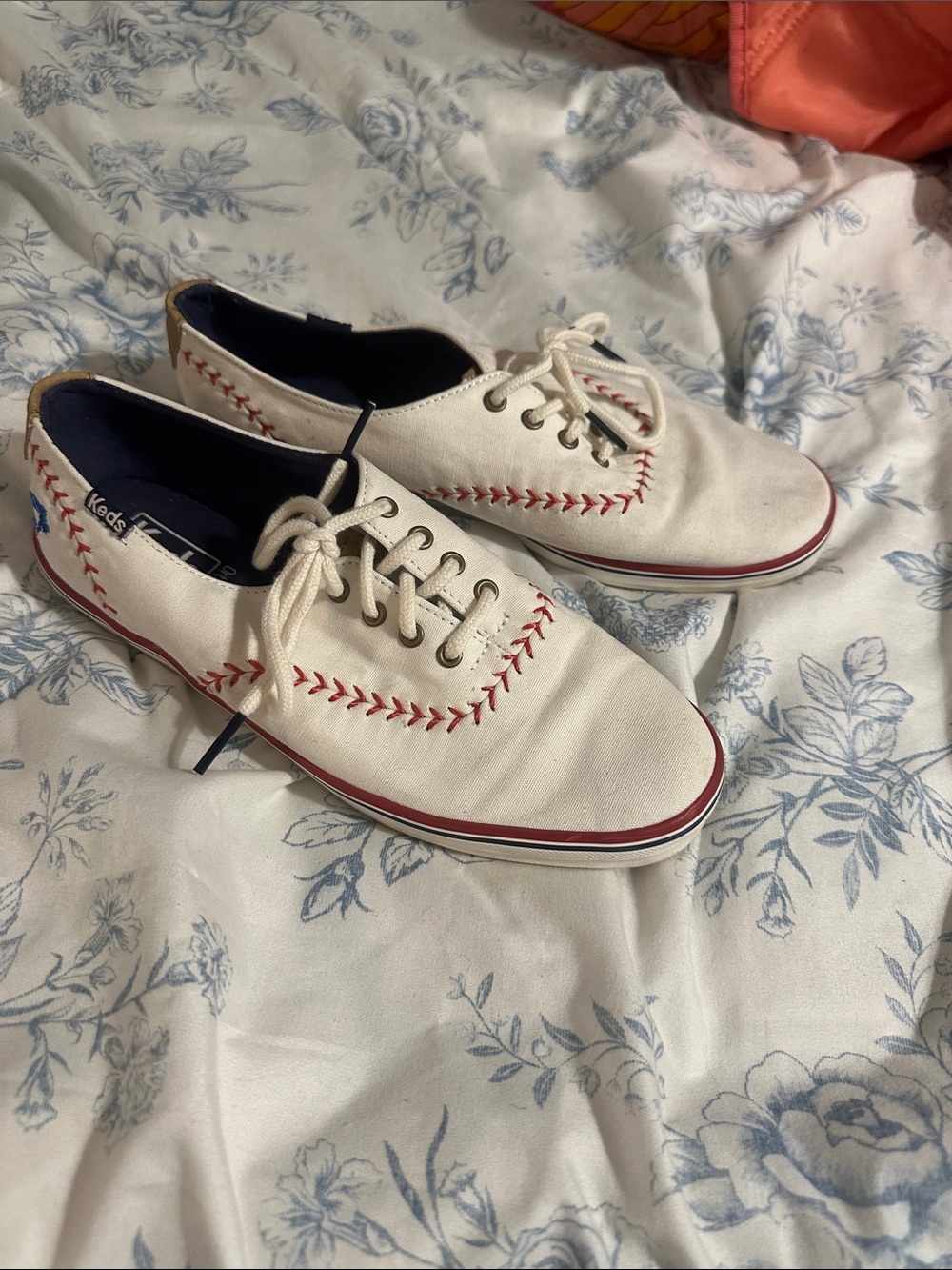 Keds White Canvas Sneakers with Red Stitching